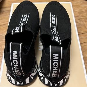 Michael Kors sneakers 7.5  Bodie slip on soft stretch zebra